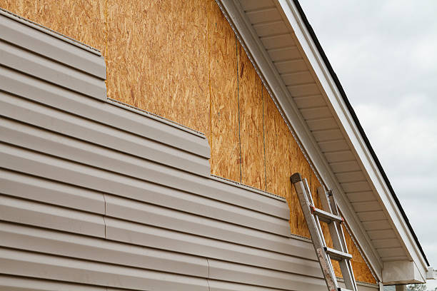 Professional Siding Contractor technician working in Marshall, TX